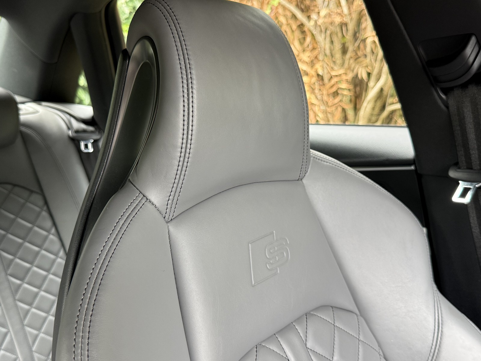 Headrest embossing