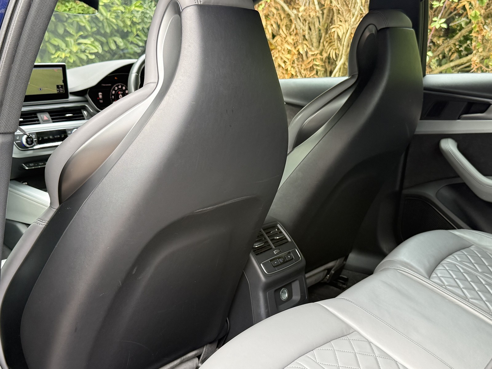 Rear of front seats