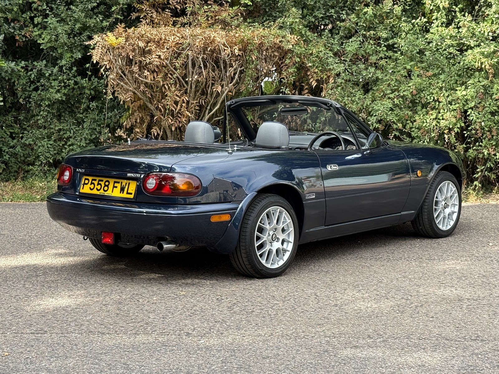 Roof Down OSR qtr Left